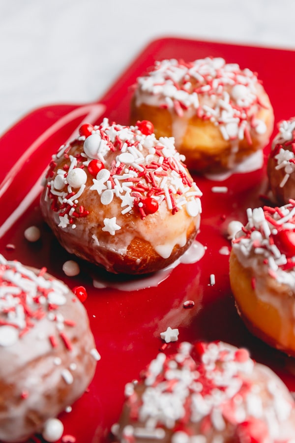 Light as air, these homemade jelly donuts, also known as Berliners, are pure magic! They're so fluffy, so light and not too sweet! Let me show how to make these treats, step by step.  #jellydonuts #donuts #bestdonuts #doughnuts