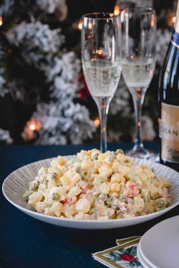 Classic holiday dinner staple, this Russian potato salad is SO satisfying and easy to make!  #russiansalad #russianpotatosalad #oliviersalad