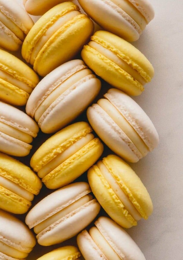 Yellow and white macarons.