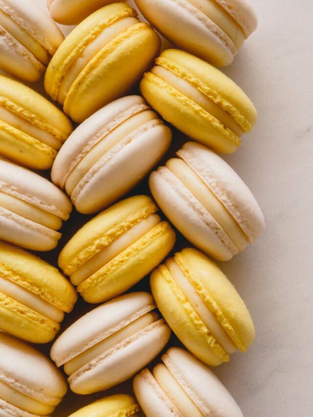 Yellow and white macarons.