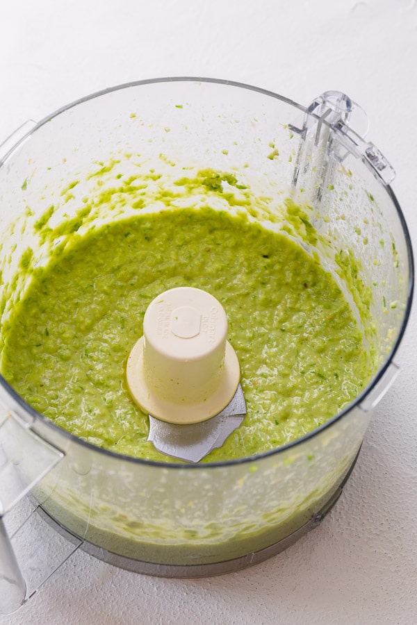 Aromatic, yet mild, garlic scape pesto is a perfect addition to any pasta. #pesto #garlicscapes