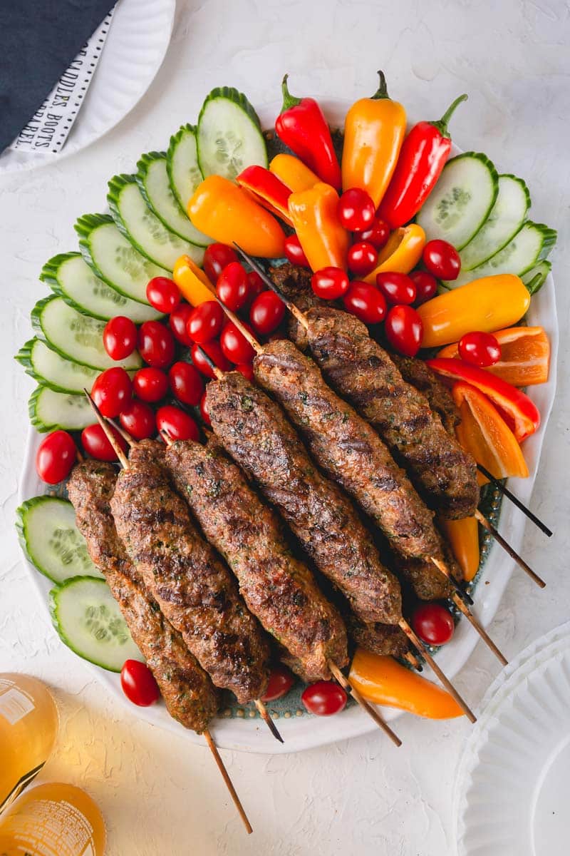 These Urfa kebabs are so juicy and flavorful with just handful of ingredients! Unlike Adana kebabs, Urfa kebabs are not spicy, which means even kids will enjoy! #urfakebabs #turkishkebabs #kebabs #grillingrecipe