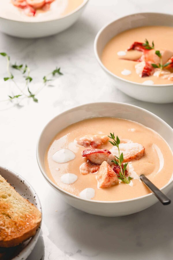 Lobster Bisque in bowl with spoon