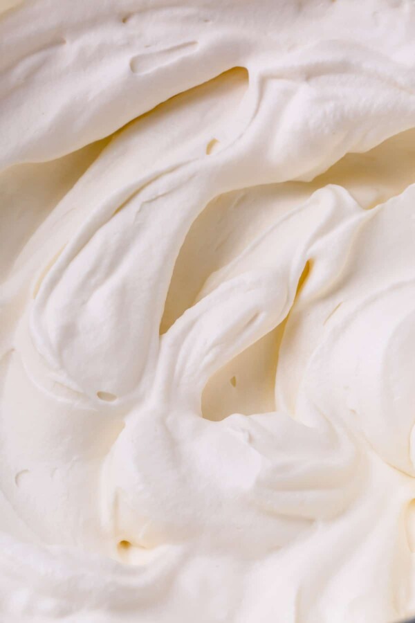 Close-up image of fluffy white tiramisu cream filling.