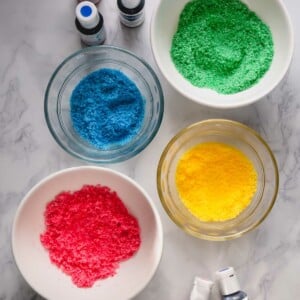 Bowls of colored sugars.