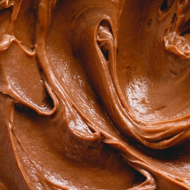 Upclose photo of smooth chocolate buttercream.