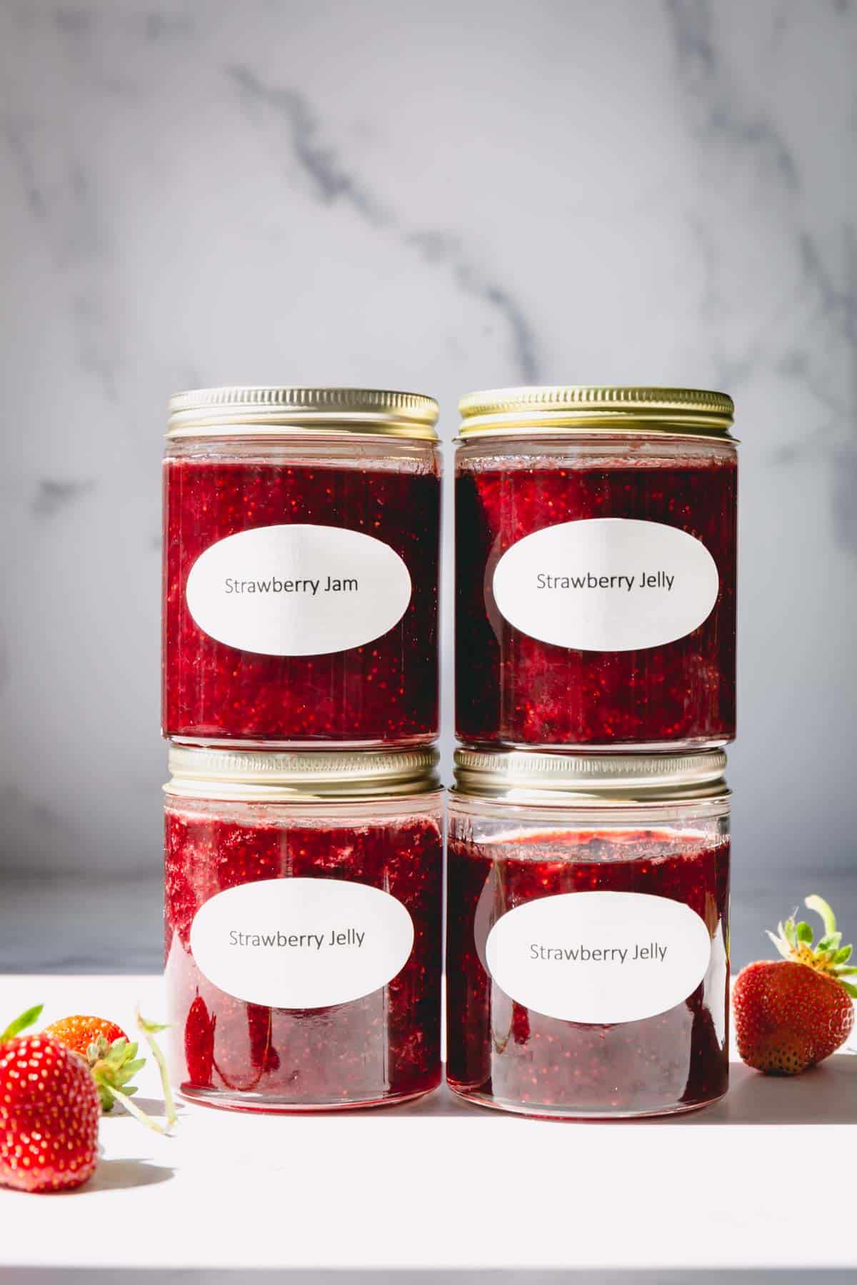 4 jars of homemade strawberry jam.