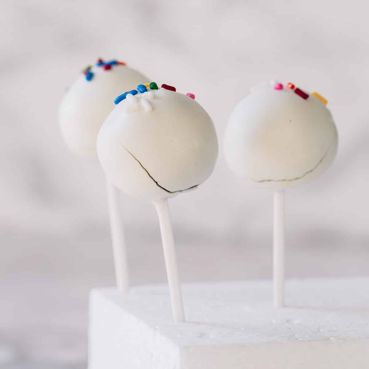 cake pops with cracked coating.