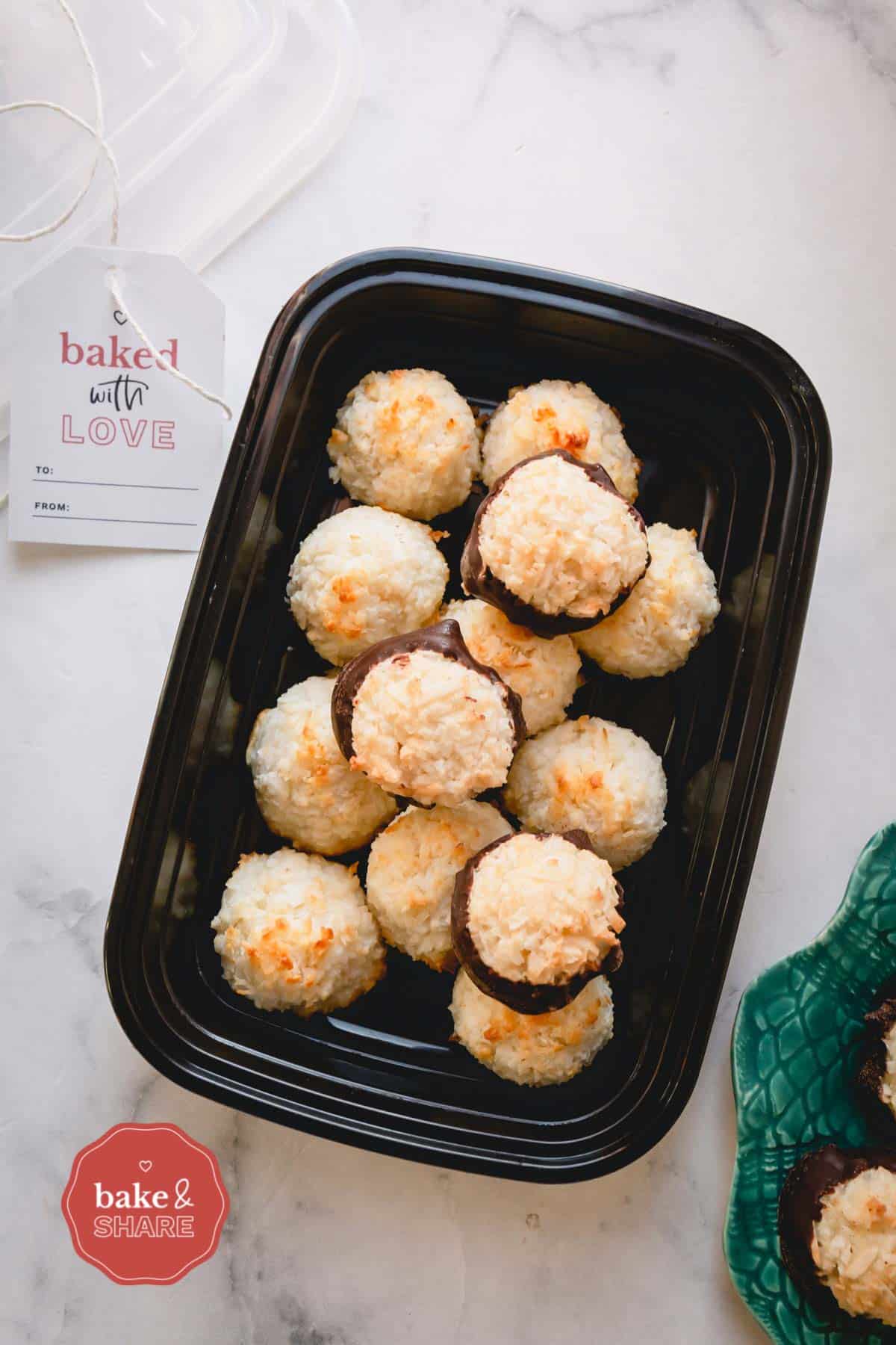 Coconut macaroons in a plastic container.