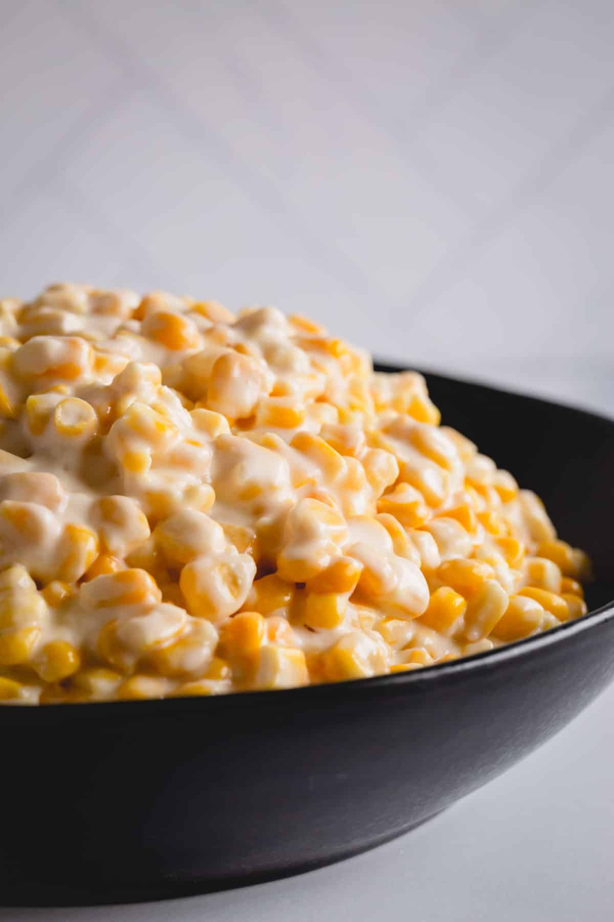 a bowl of creamed corn.