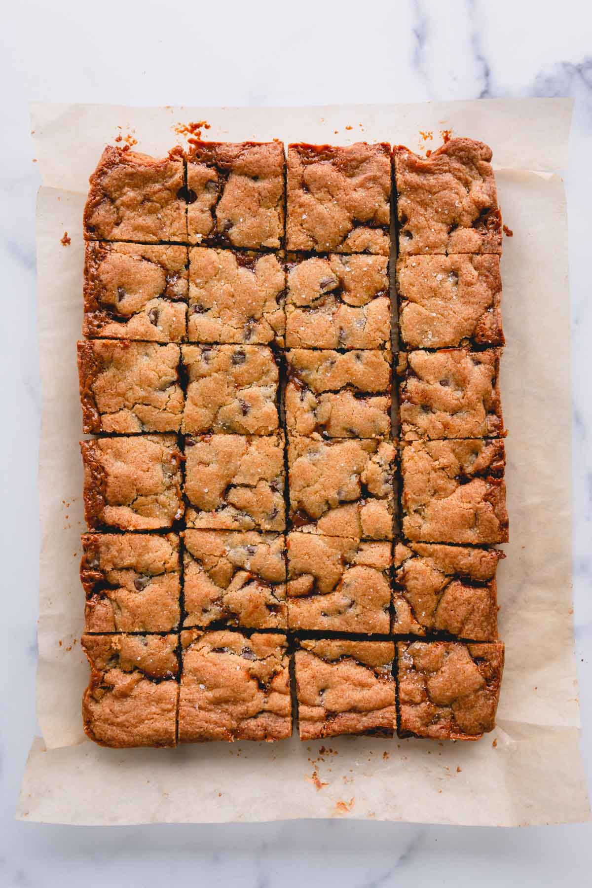 a large cookie bar cut into squares.