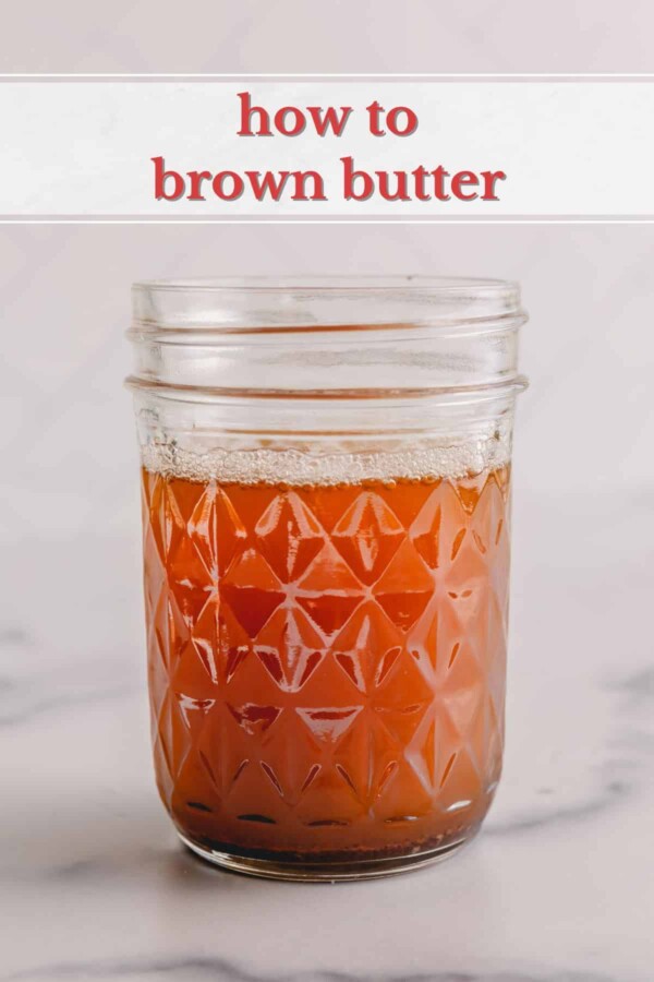 Liquid browned butter in a glass jar.