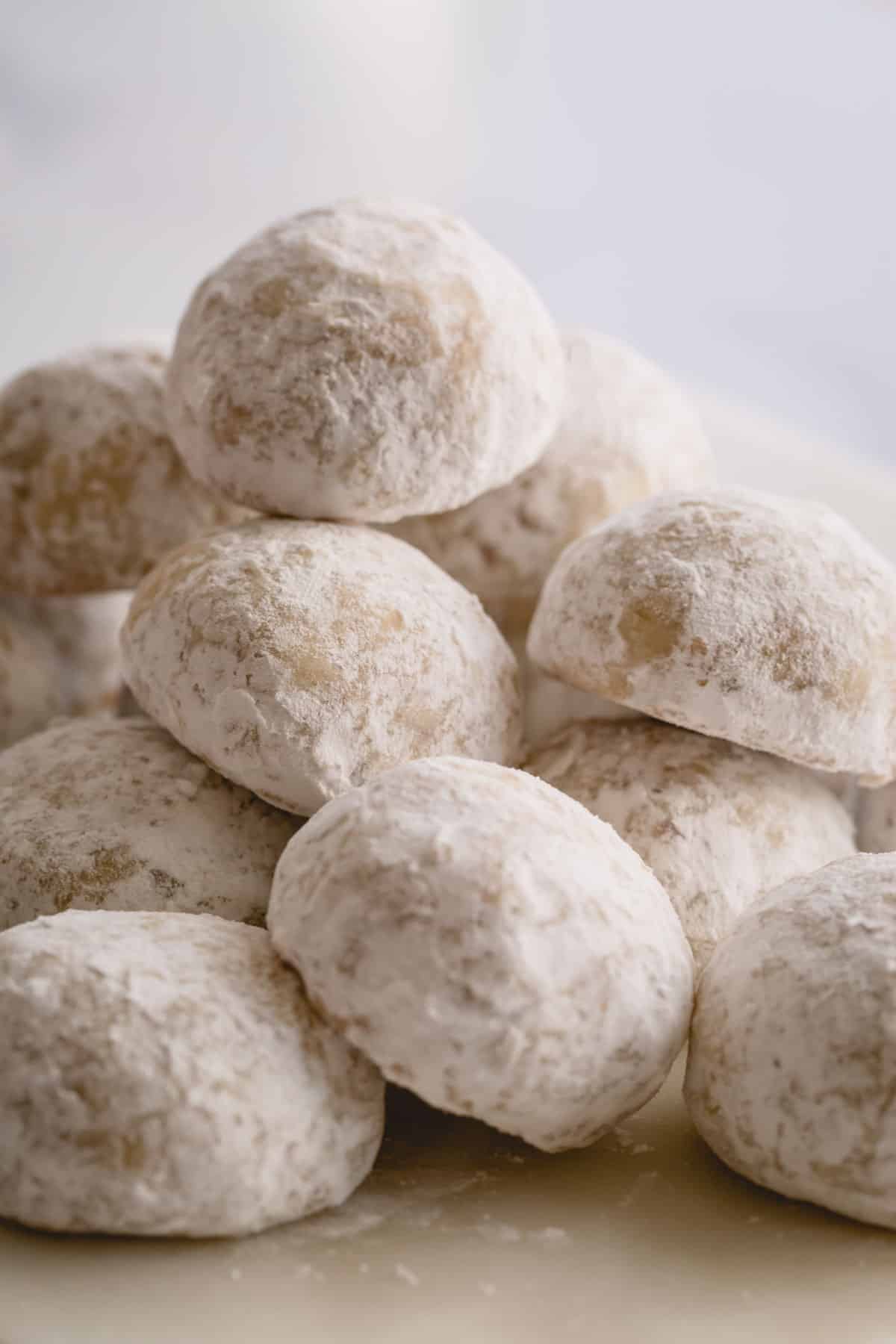 a stack of snowball cookies.