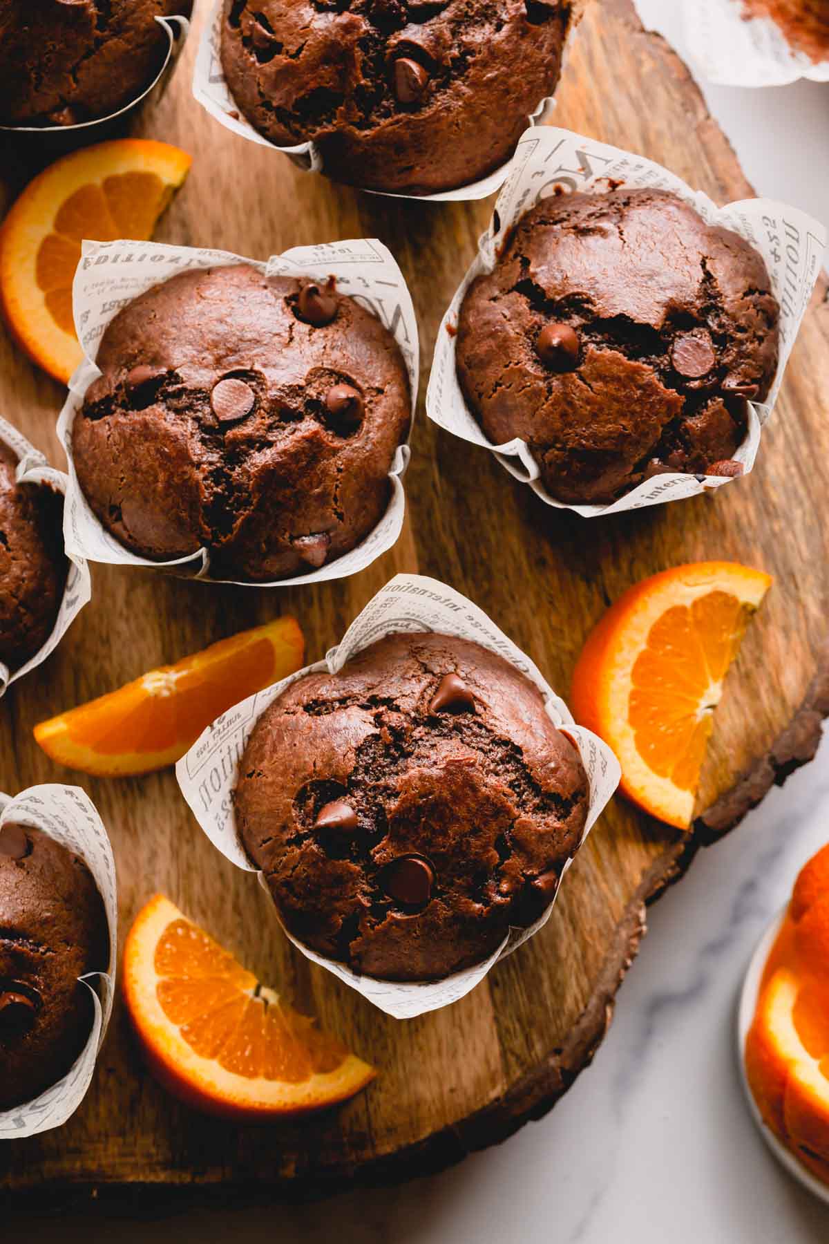 chocolate muffins with orange slices.