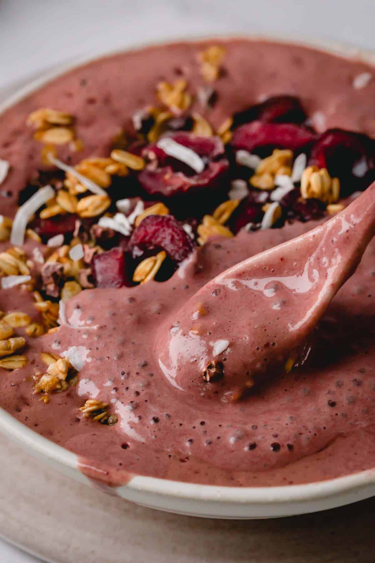 a spoonful of chocolate cherry smoothie bowl. 