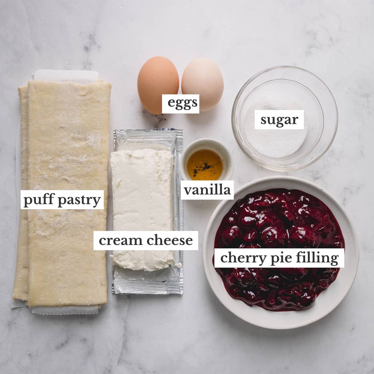 Ingredients to make cherry cheese danishes.