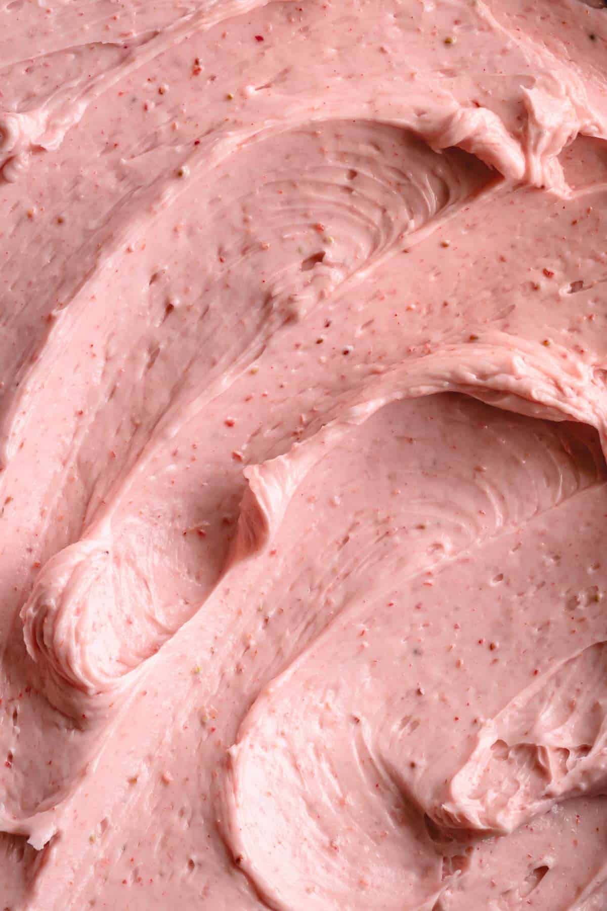close up of strawberry swiss meringue buttercream.