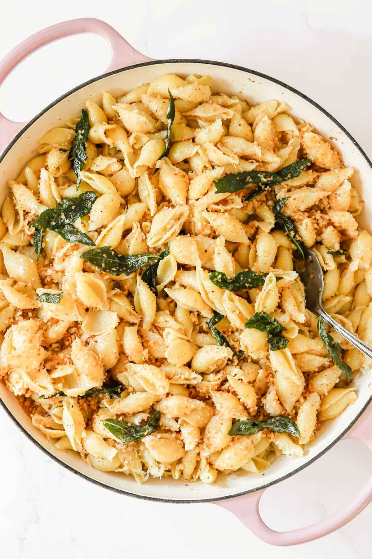 Overhead image of a large pot of brown butter pasta.