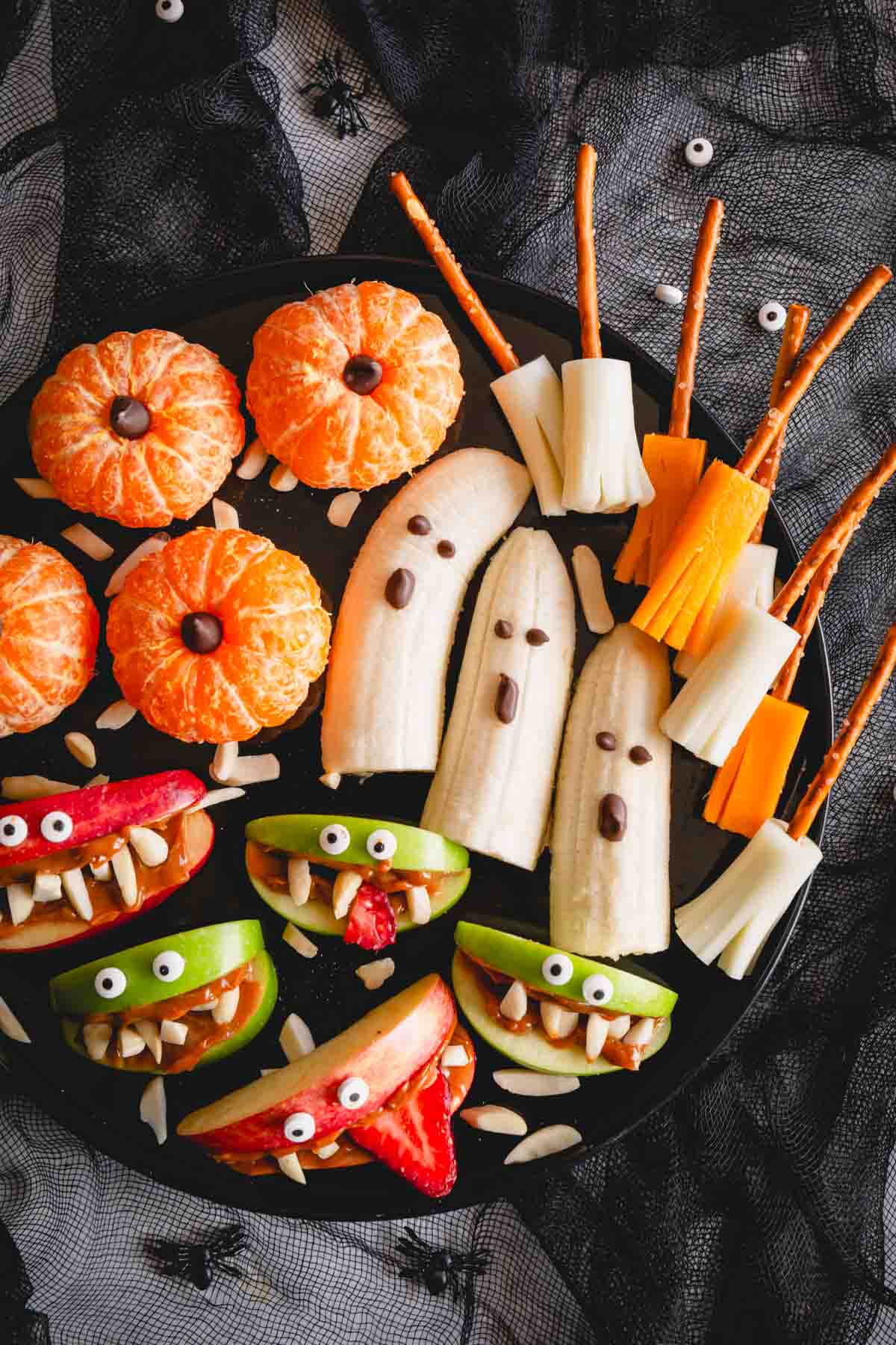 Overhead image of a healthy Halloween snack board for kids.
