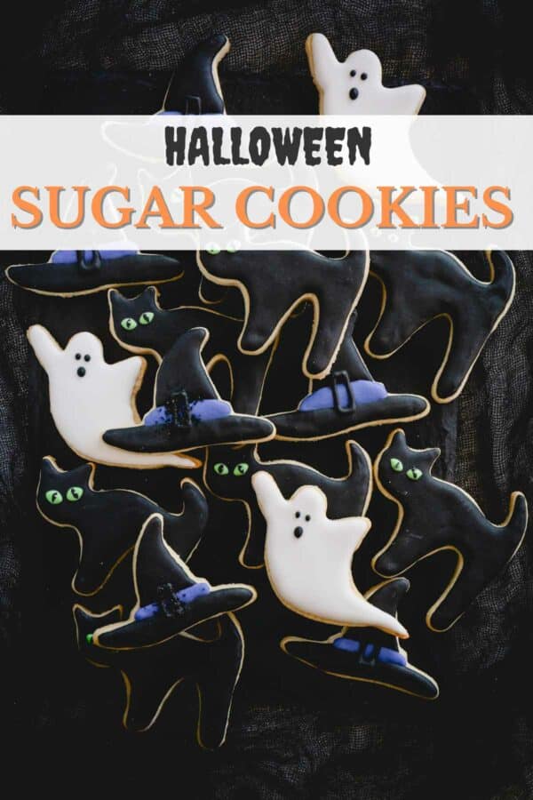 An image of ghost, witch hats, and cat cookies with a banner that reads "Halloween Sugar Cookies".
