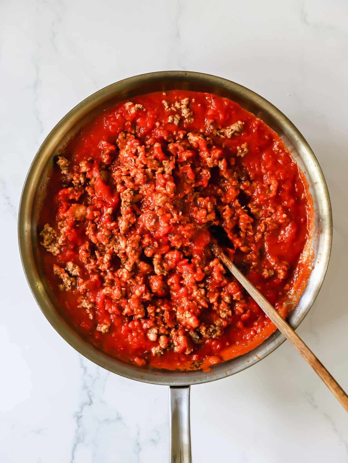 Pasta sauce with meat in a skillet.