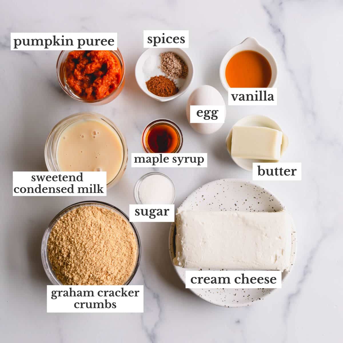 Overhead image of pumpkin cheesecake bar ingredients.