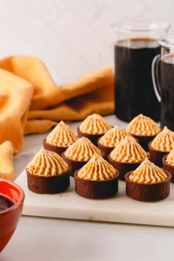 Pumpkin mousse in chocolate cups.