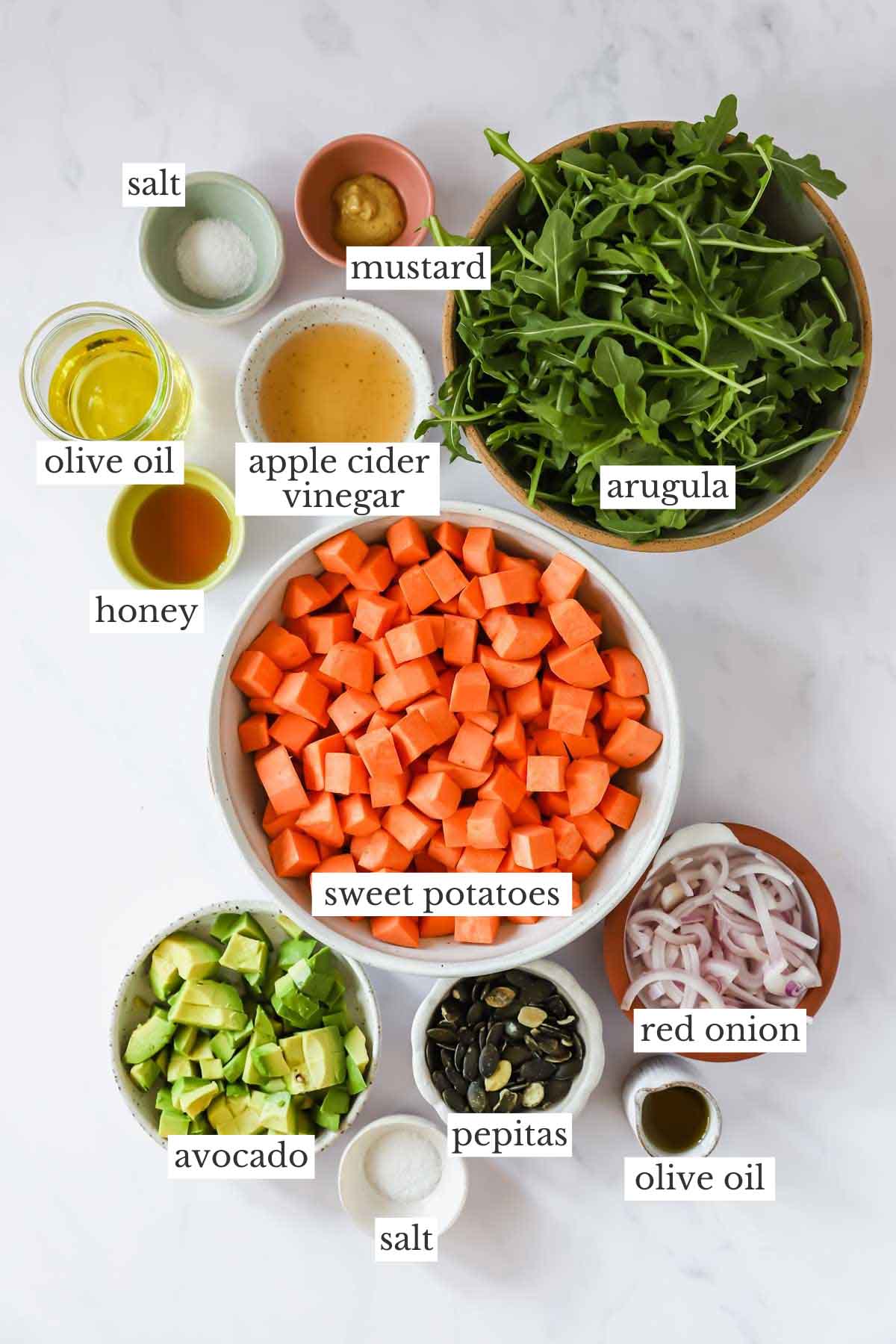 Ingredients to make a sweet potato salad with a homemade vinaigrette.