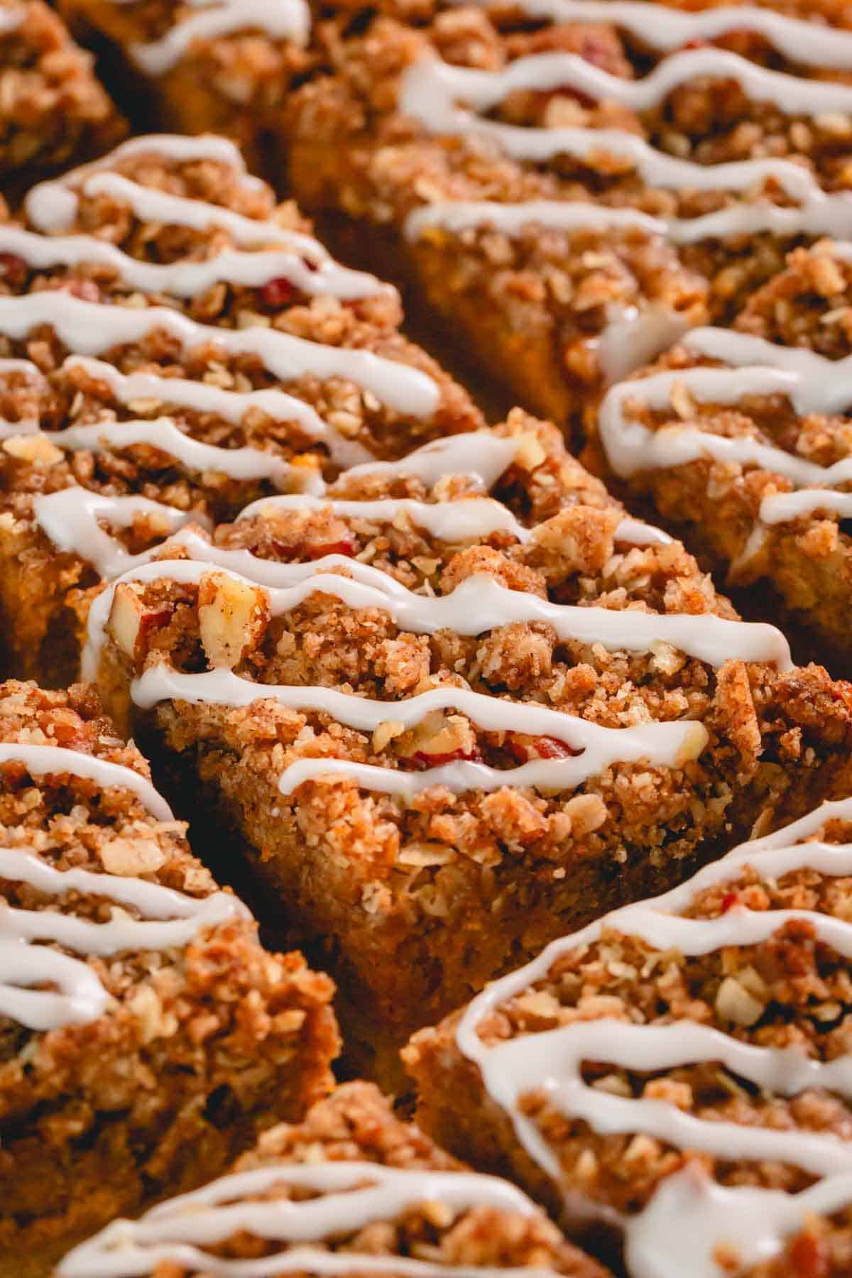 Close up view of iced pumpkin streusel bars.
