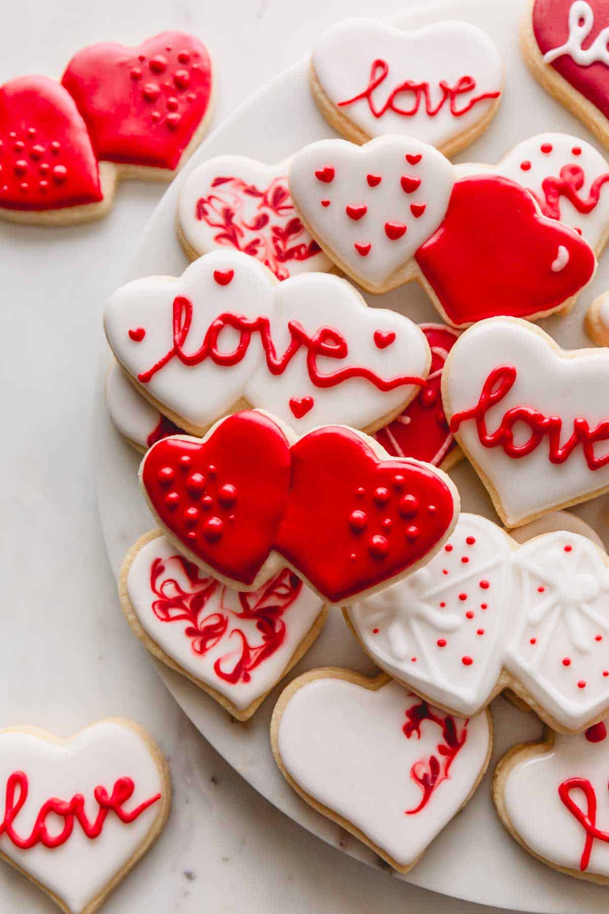 Valentine's Day sugar cookies with red and white icing.