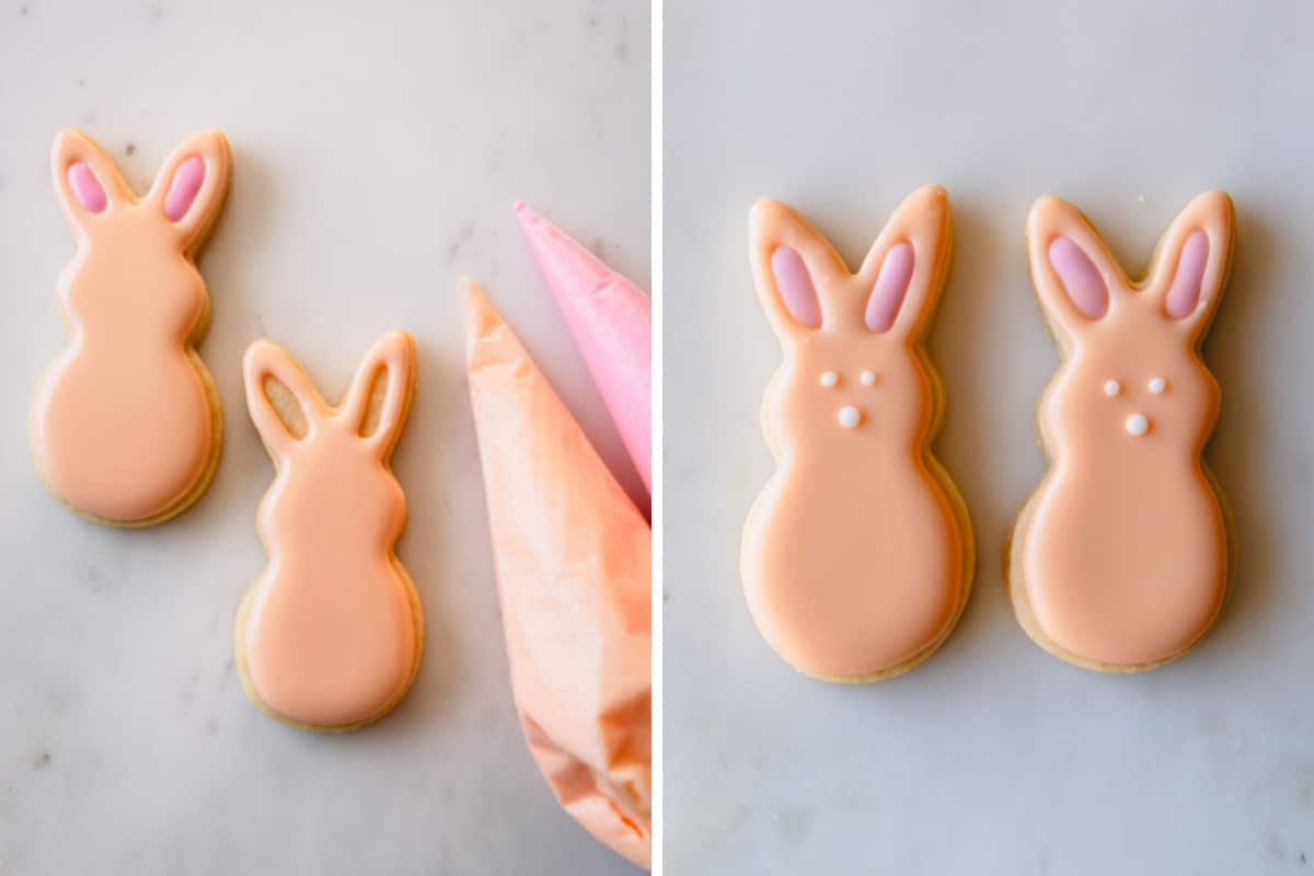 Two pink Easter bunny sugar cookies with pink ears and white eyes and noses.