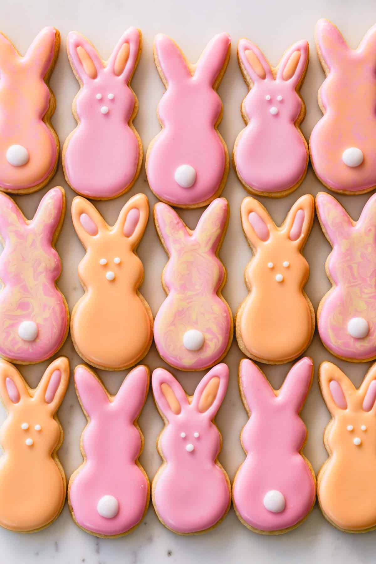 Pink and orange Easter sugar cookie bunny cookies.