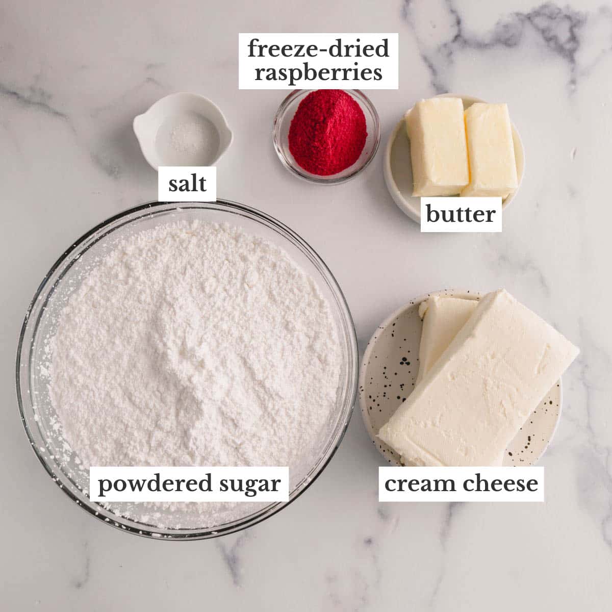 Ingredients to make raspberry cream cheese frosting.