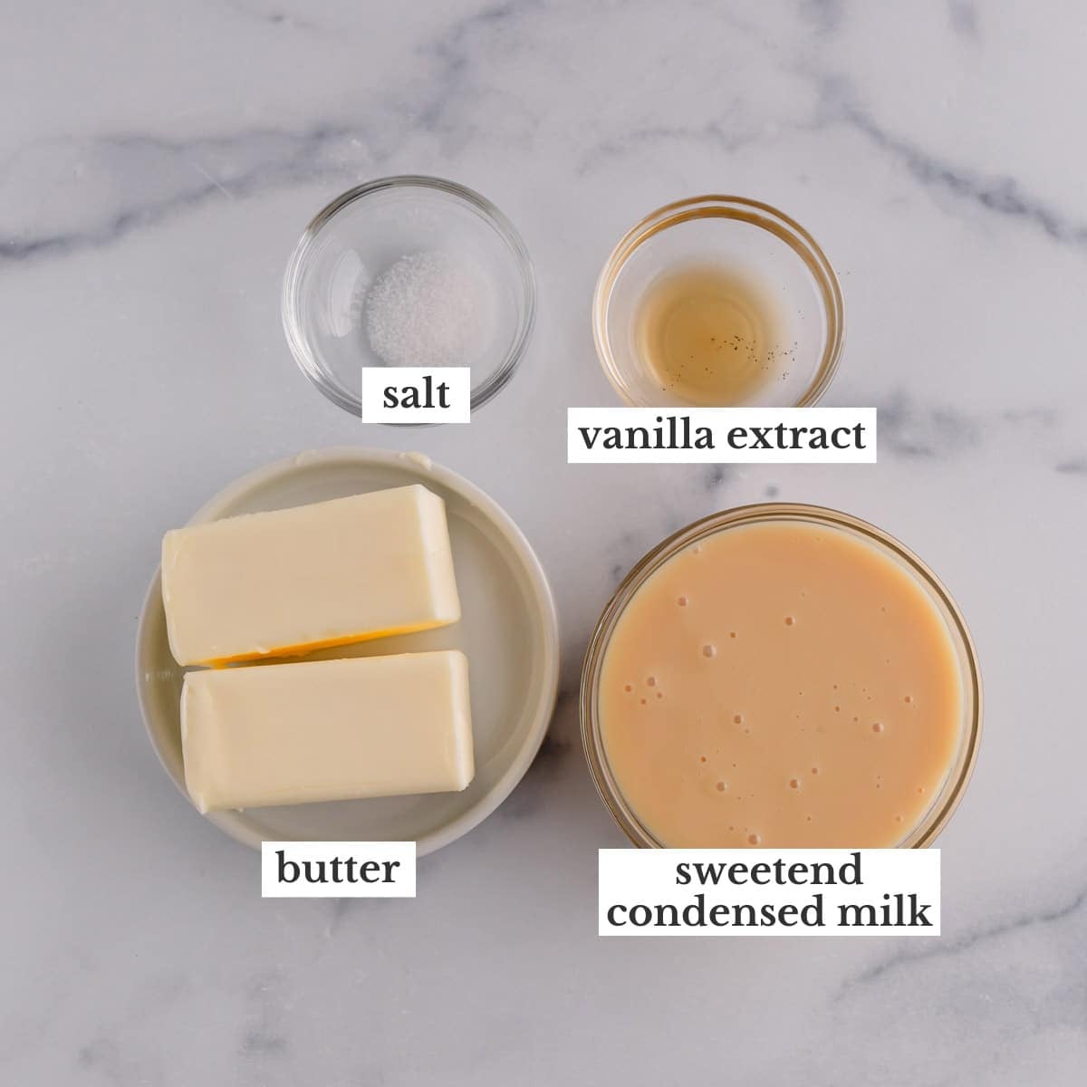 Salt, butter, sweetened condensed milk, and vanilla extract in bowls.