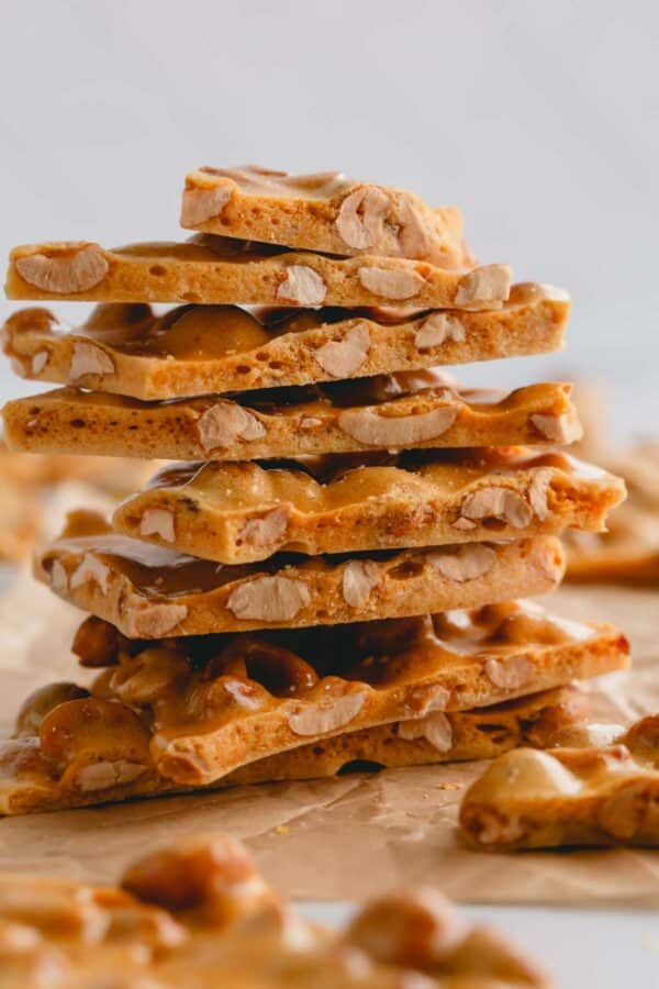 A stack of microwave peanut brittle pieces.