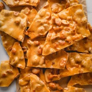 Overhead view of pieces of peanut brittle.