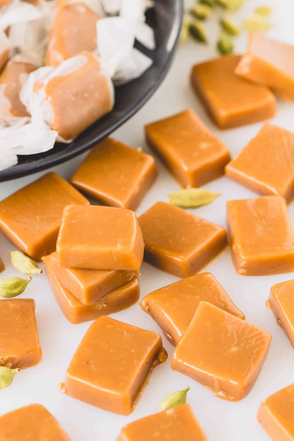 Cardamom caramel candy pieces.