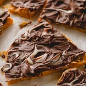 Pieces of chocolate peanut brittle.