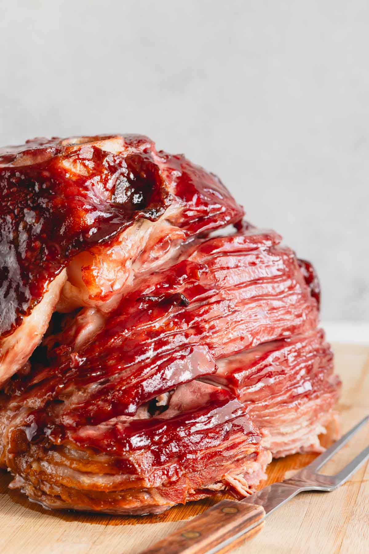 A cooked spiral ham with 2-ingredient glaze.