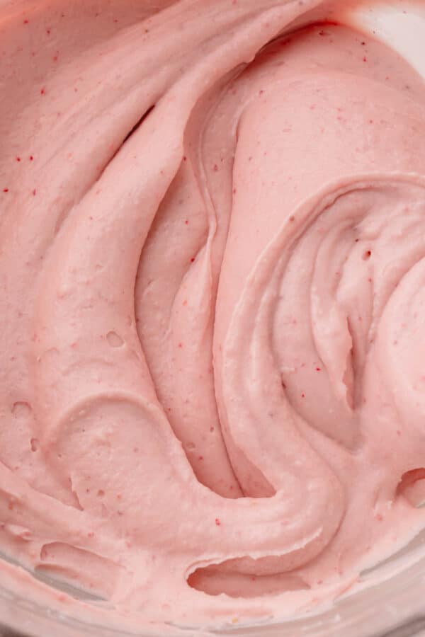 Strawberry cream cheese frosting with flecks of freeze-dried strawberries.