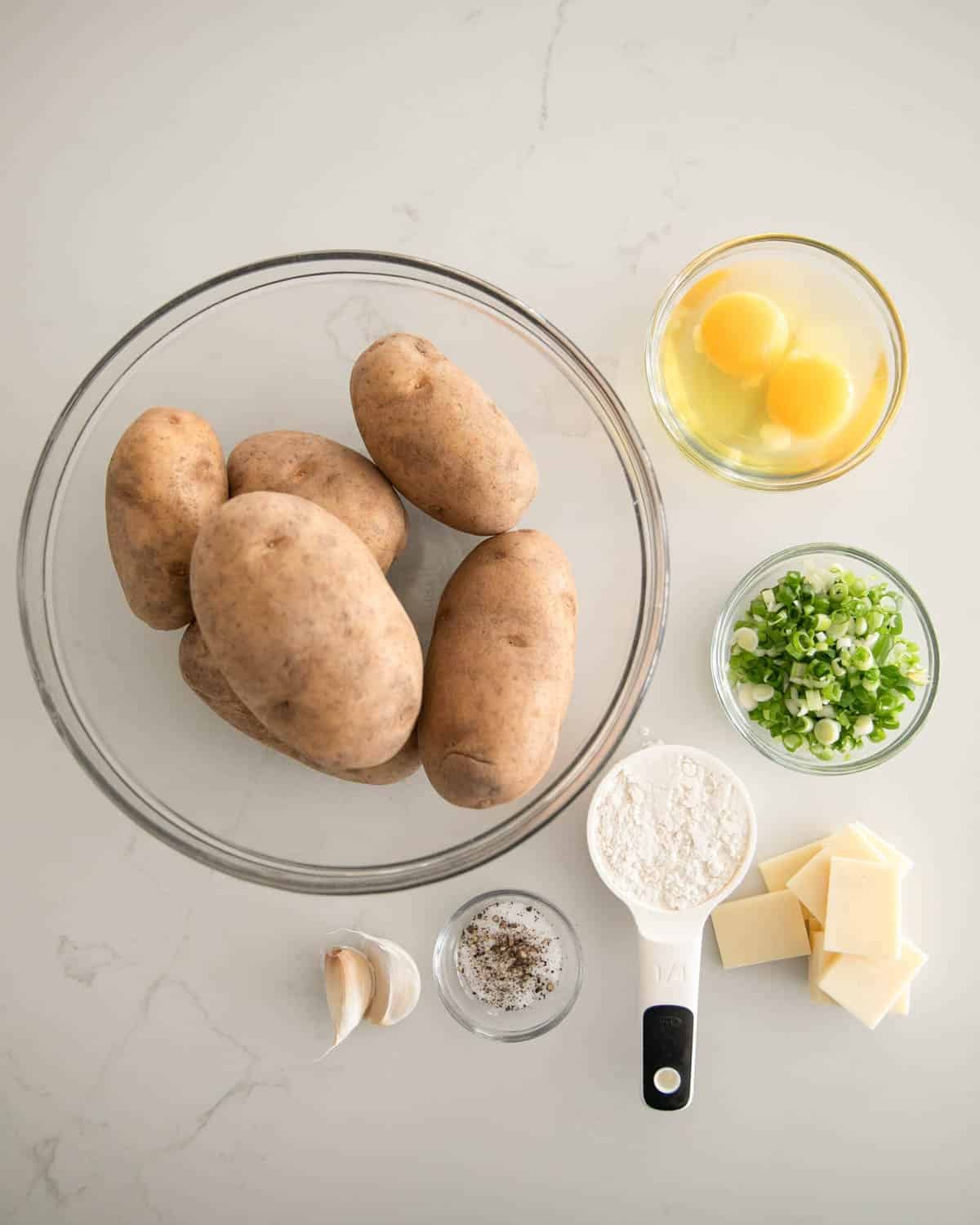 Ingredients for cheesy potato pancakes.