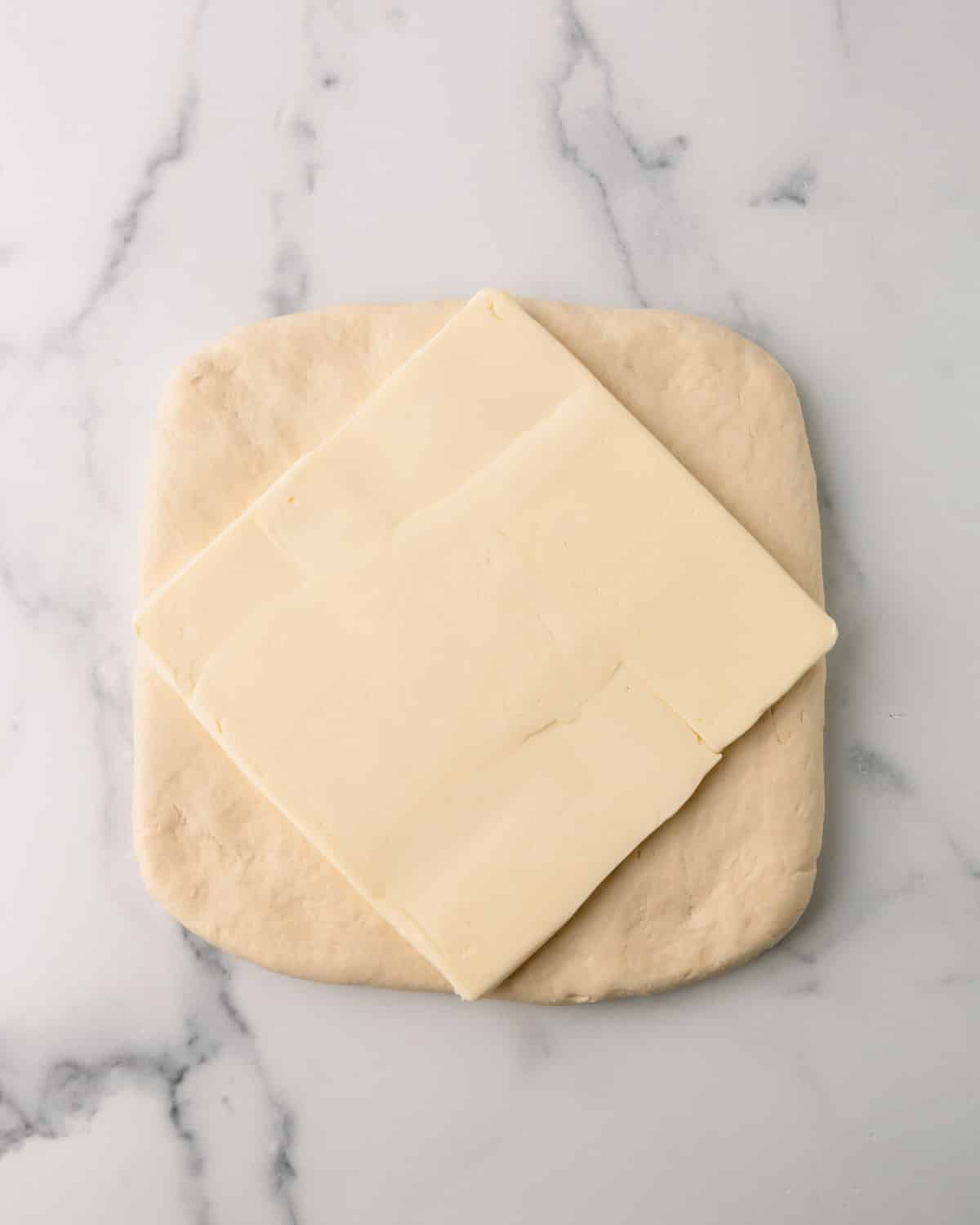 Croissant dough with butter over the top.