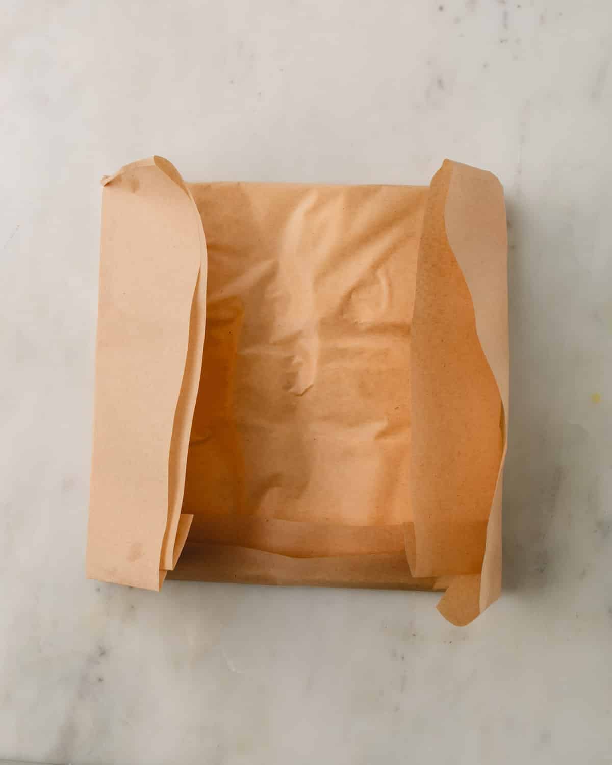 Parchment paper being folded.