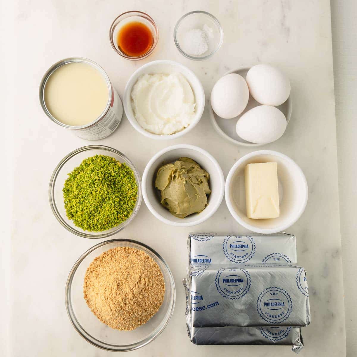 Image if pistachio cheesecake ingredients.